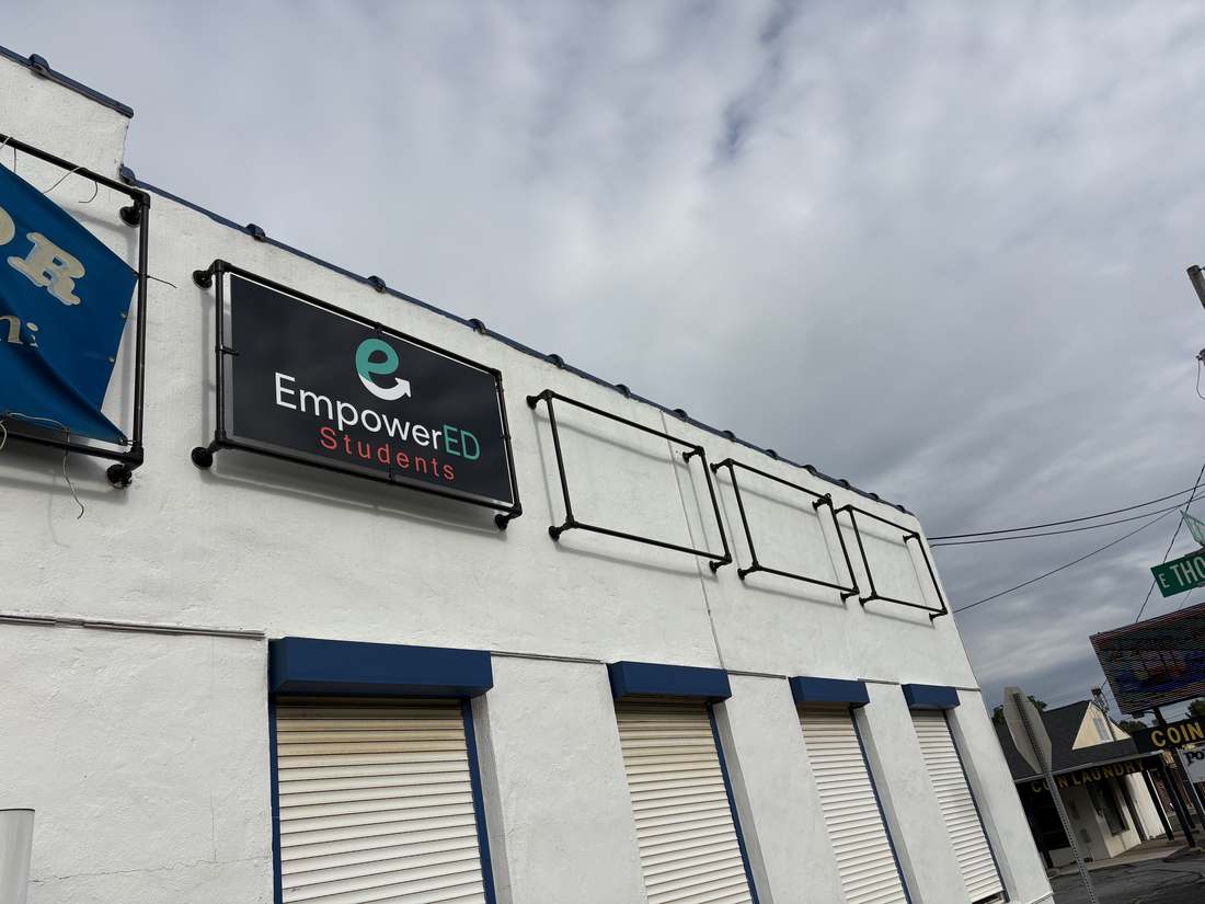 The EmpowerED Students sign on the building at 202 South Third Street in Coopersburg, seen from the street